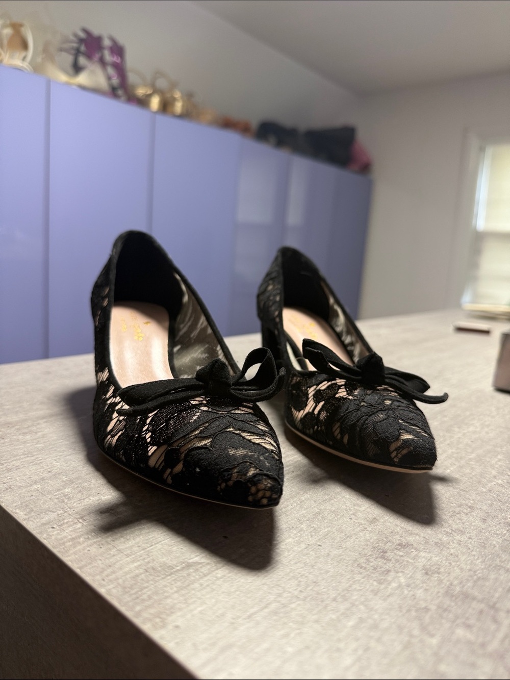 kate spade Black Lace Pointed Toe Heels with Bow Accent